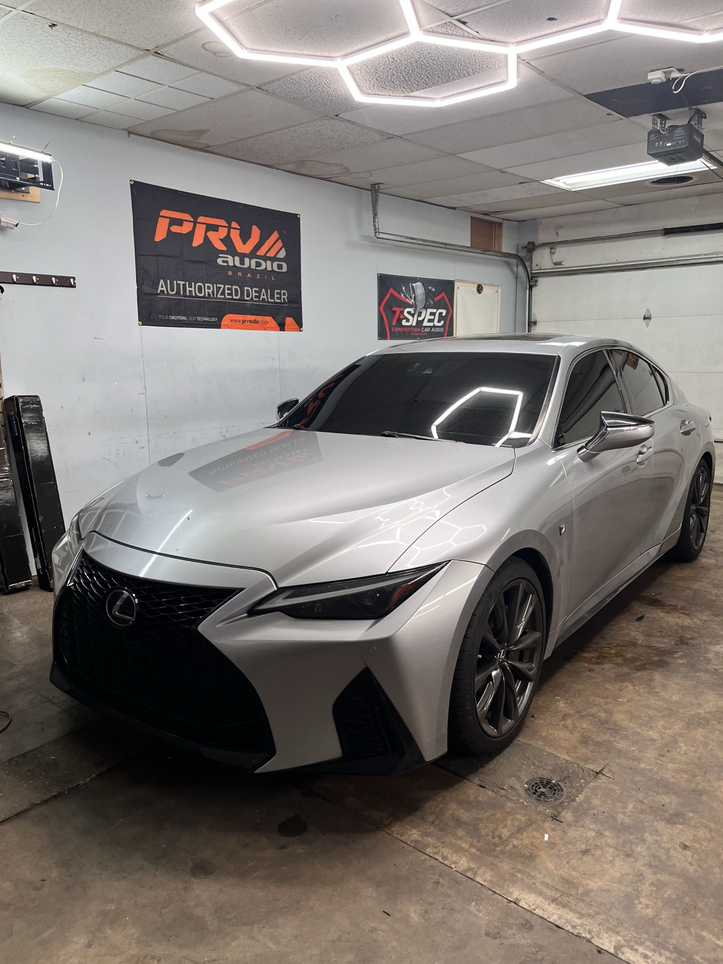Silver Lexus IS F Sport sedan with ceramic window tint