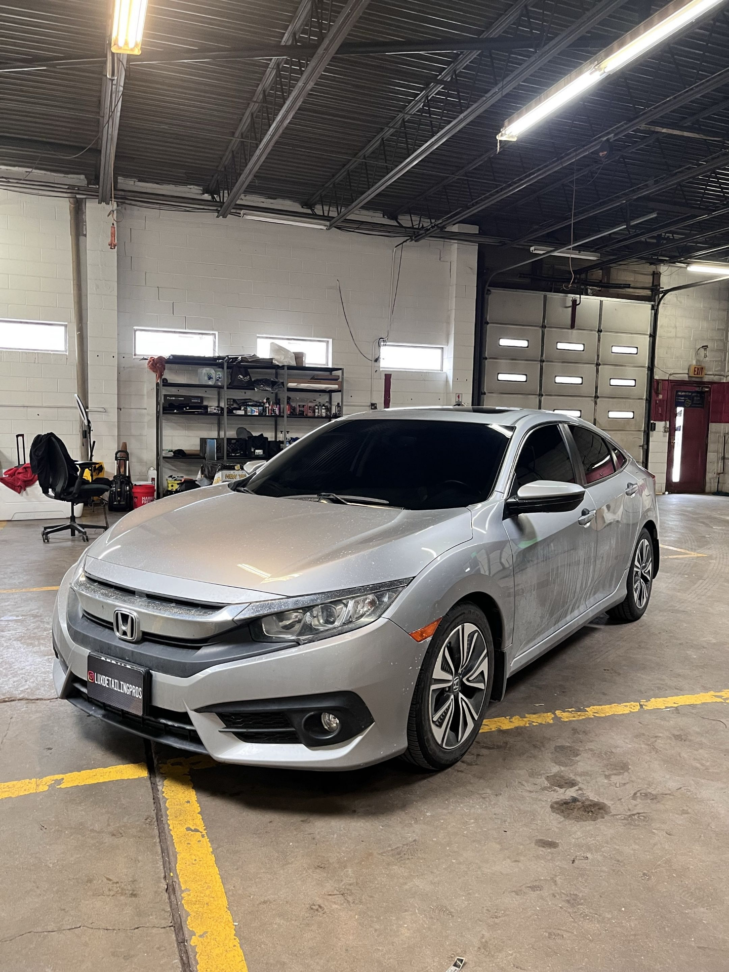 Silver Honda Civic sedan with dark window tint installed