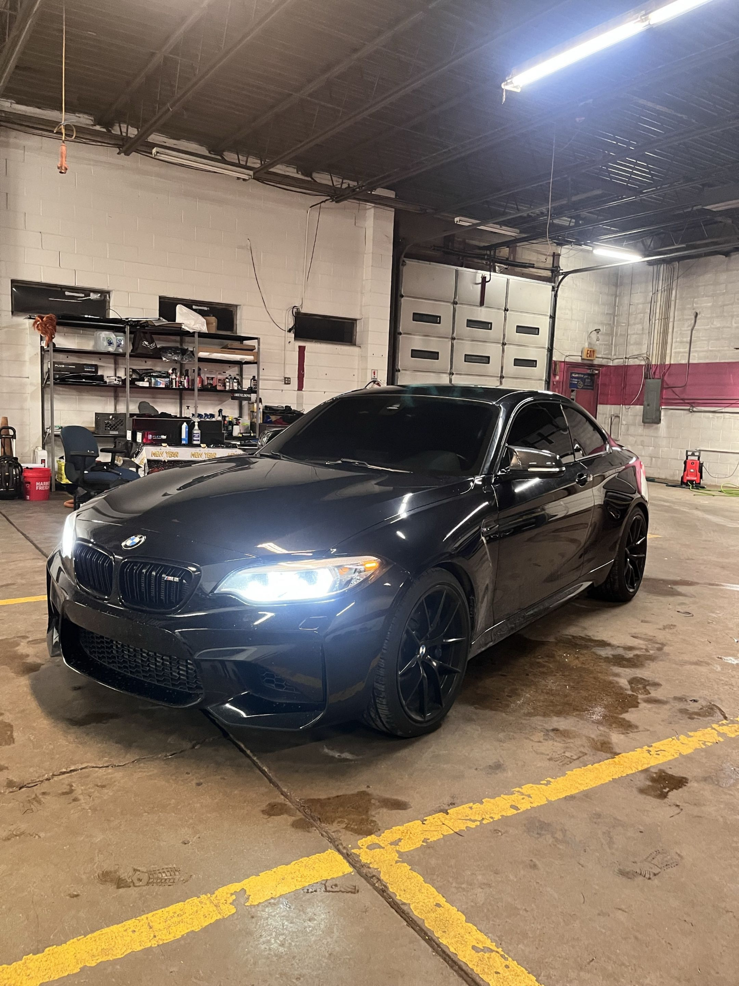 Black BMW M2 coupe with ceramic window tint installed